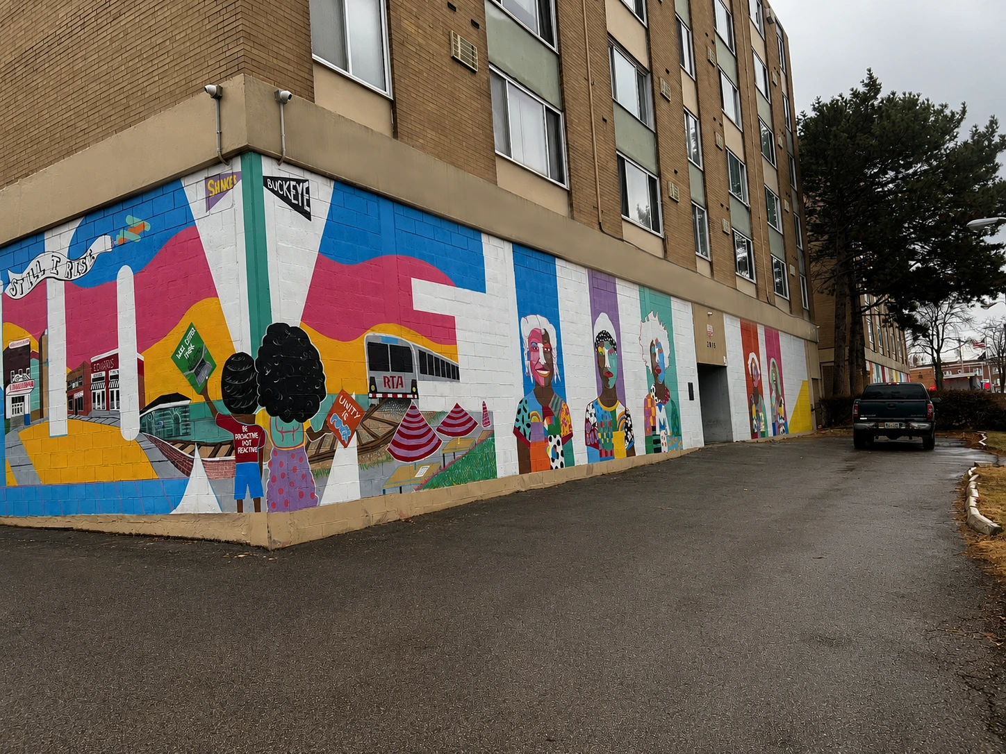 The colorful mural wrapping Shaker Square Apartments